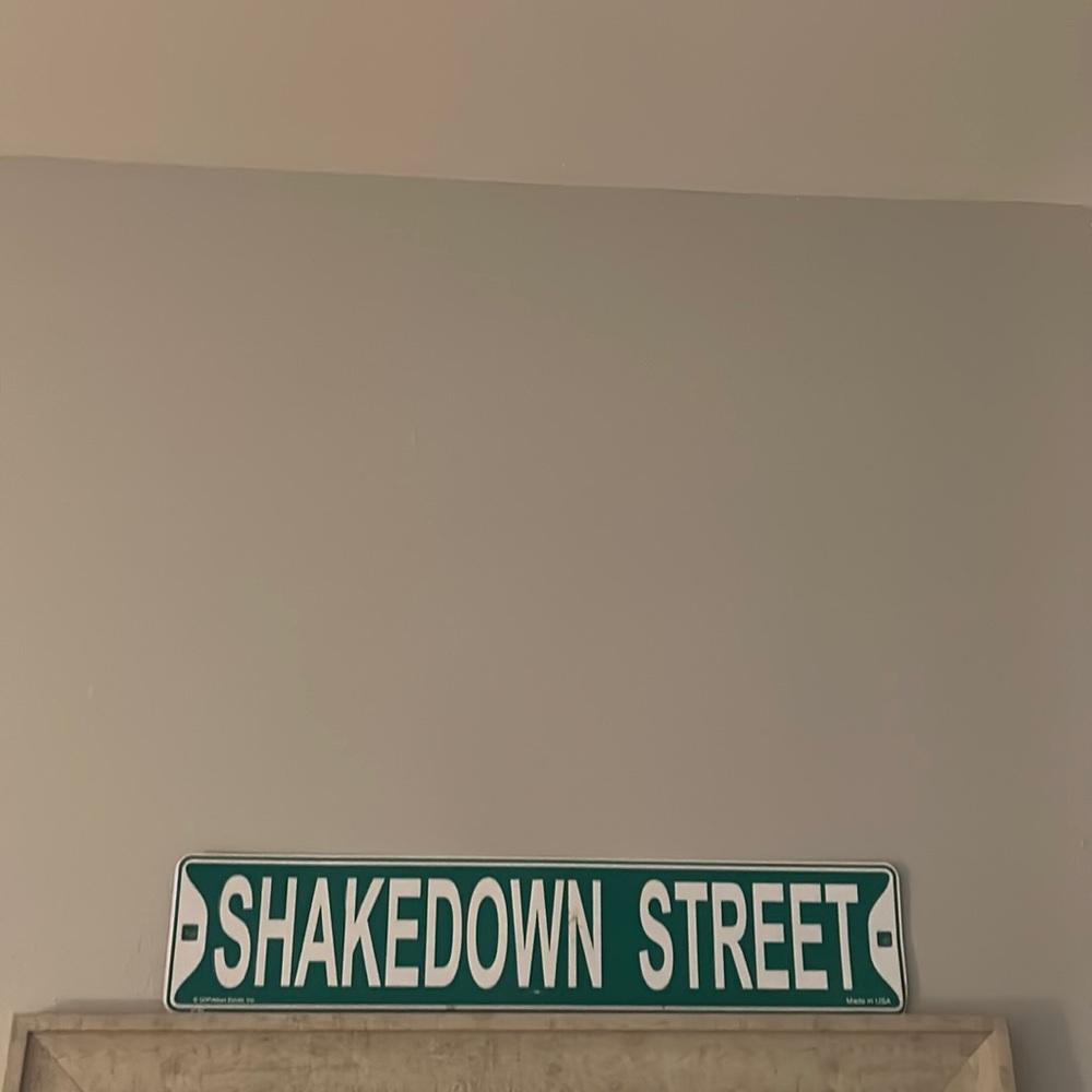 Shake down street sign